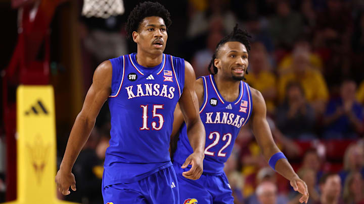 Mar 3, 2026; Tempe, Arizona, USA; Kansas Jayhawks forward Bryson Tiller (15) and guard Darryn Peterson (22) against the Arizona State Sun Devils at Desert Financial Arena. Mandatory Credit: Mark J. Rebilas-Imagn Images
