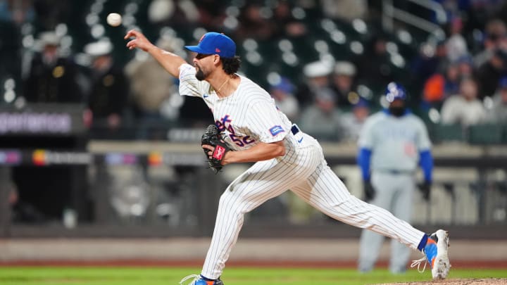 Apr 30, 2024; New York City, New York, USA; New York Mets pitcher Jorge Lopez (52) delivers a pitch against the Chicago Cubs during the ninth inning at Citi Field. Mandatory Credit: Gregory Fisher-USA TODAY Sports