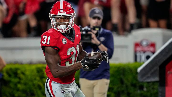 Sep 2, 2023; Athens, Georgia, USA; Georgia Bulldogs defensive player Kyron Jones (31) returns an interception for a touchdown against the Tennessee Martin Skyhawks during the second half at Sanford Stadium. Mandatory Credit: Dale Zanine-USA TODAY Sports