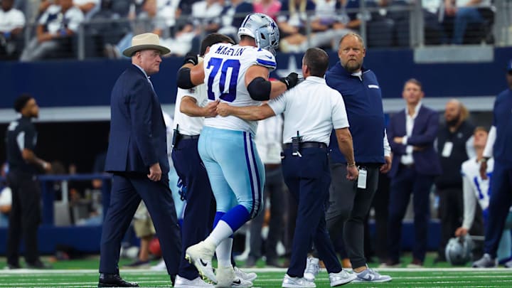 Dallas Cowboys guard Zack Martin walks off injured during the second half against the New Orleans Saints at AT&T Stadium.