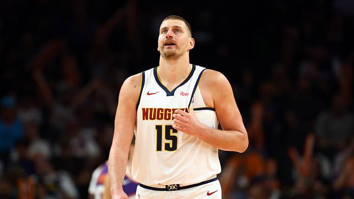 Mar 24, 2026; Phoenix, Arizona, USA; Denver Nuggets center Nikola Jokic (15) reacts against the Phoenix Suns at Mortgage Matchup Center. Mandatory Credit: Mark J. Rebilas-Imagn Images Mar 24, 2026; Phoenix, Arizona, USA; Denver Nuggets center Nikola Jokic (15) reacts against the Phoenix Suns at Mortgage Matchup Center. Mandatory Credit: Mark J. Rebilas-Imagn Images