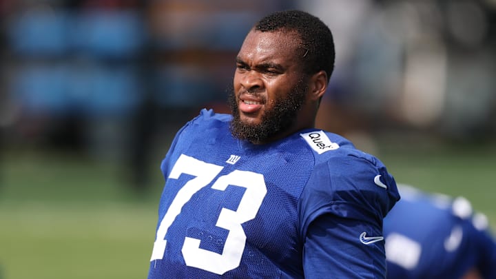 Aug 4, 2025; East Rutherford, NJ, USA; New York Giants offensive tackle Evan Neal (73) on the field during training camp at Quest Diagnostics Training Center. Mandatory Credit: Vincent Carchietta-Imagn Images