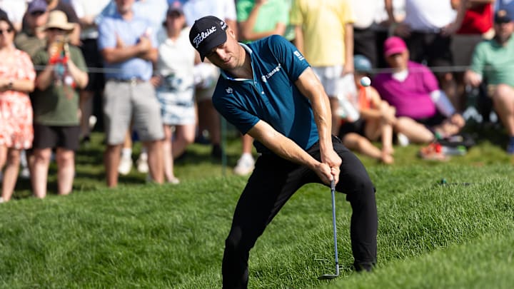 Justin Thomas chips out of the rough on the ninth hole during the third round of the Travelers Championship golf tournament. Justin Thomas chips out of the rough on the ninth hole during the third round of the Travelers Championship golf tournament.