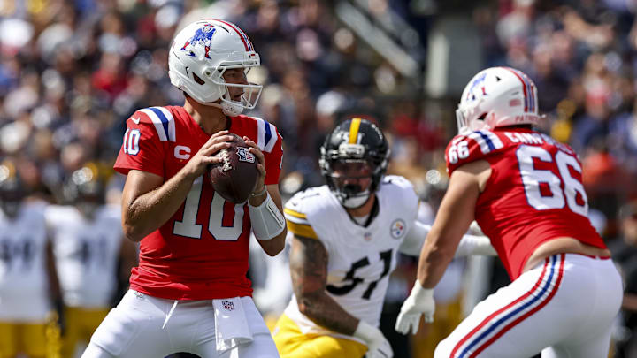 Sep 21, 2025; Foxborough, Massachusetts, USA; New England Patriots quarterback Drake Maye (10) looks to pass the ball during the first quarter at Gillette Stadium. Mandatory Credit: Paul Rutherford-Imagn Images
