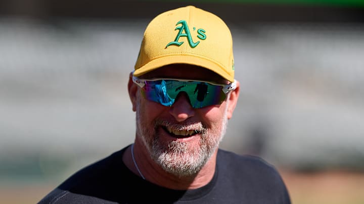 Sep 7, 2024; Oakland, California, USA; Oakland Athletics manager Mark Kotsay (7) smiles during warmups before the game between the Detroit Tigers and the Oakland Athletics at Oakland-Alameda County Coliseum. Mandatory Credit: Robert Edwards-Imagn Images