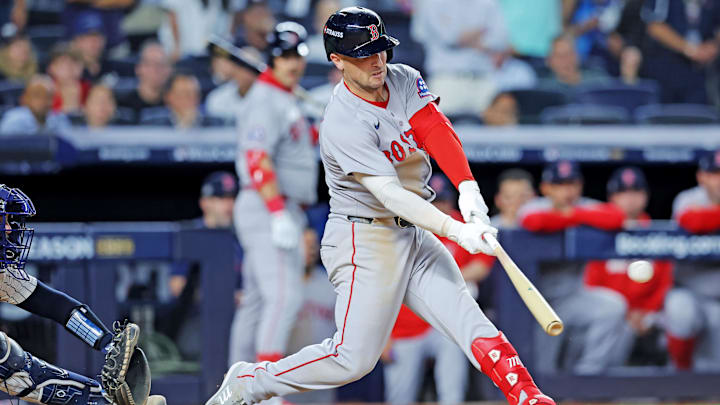 Sep 30, 2025; Bronx, New York, USA; Boston Red Sox third base Alex Bregman (2) hits an RBI double during the ninth inning against the New York Yankees during game one of the Wildcard round for the 2025 MLB playoffs at Yankee Stadium. Mandatory Credit: Brad Penner-Imagn Images Sep 30, 2025; Bronx, New York, USA; Boston Red Sox third base Alex Bregman (2) hits an RBI double during the ninth inning against the New York Yankees during game one of the Wildcard round for the 2025 MLB playoffs at Yankee Stadium. Mandatory Credit: Brad Penner-Imagn Images
