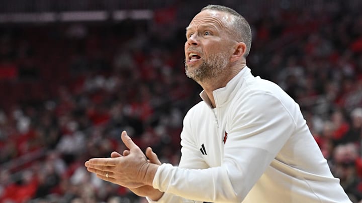 Jan 13, 2026; Louisville, Kentucky, USA;  Louisville Cardinals head coach Pat Kelsey reacts during the first half against the Virginia Cavaliers at KFC Yum! Center. . Mandatory Credit: Jamie Rhodes-Imagn Images