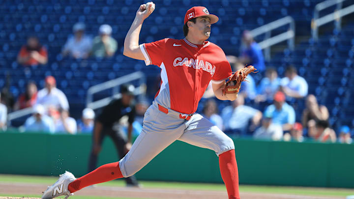 Mar 4, 2026: Canada starting pitcher Cal Quantrill (47) throws a pitch during the first inning against the Philadelphia Phillies at BayCare Ballpark. 