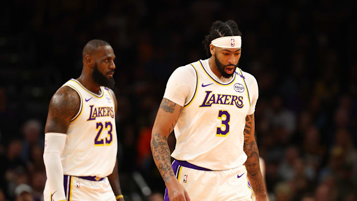 Nov 26, 2024; Phoenix, Arizona, USA; Los Angeles Lakers forward LeBron James (23) and forward Anthony Davis (3) against the Phoenix Suns during an NBA Cup game at Footprint Center. 