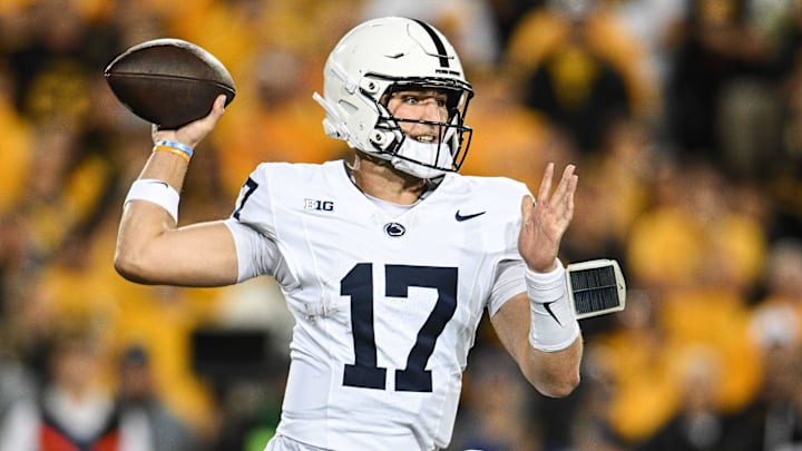 Penn State Nittany Lions quarterback Ethan Grunkemeyer throws a pass against the Iowa Hawkeyes during the first quarter at Kinnick Stadium. Penn State Nittany Lions quarterback Ethan Grunkemeyer throws a pass against the Iowa Hawkeyes during the first quarter at Kinnick Stadium.