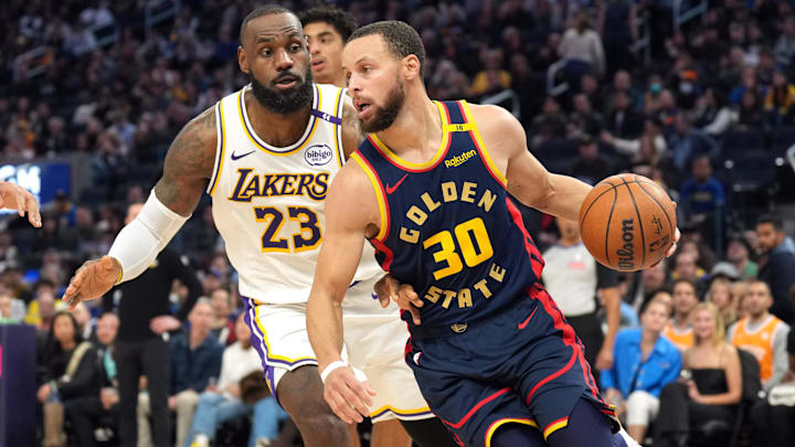 Jan 25, 2025; San Francisco, California, USA; Golden State Warriors guard Stephen Curry (30) dribbles against Los Angeles Lakers forward LeBron James (23) during the third quarter at Chase Center. Mandatory Credit: Darren Yamashita-Imagn Images Jan 25, 2025; San Francisco, California, USA; Golden State Warriors guard Stephen Curry (30) dribbles against Los Angeles Lakers forward LeBron James (23) during the third quarter at Chase Center. Mandatory Credit: Darren Yamashita-Imagn Images