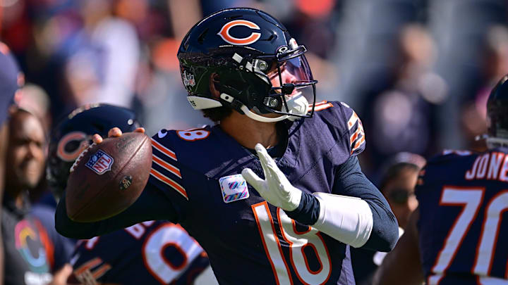 Oct 6, 2024; Chicago, Illinois, USA; Chicago Bears quarterback Caleb Williams (18) warms up before the game against the Carolina Panthers at Soldier Field. Mandatory Credit: Daniel Bartel-Imagn Images