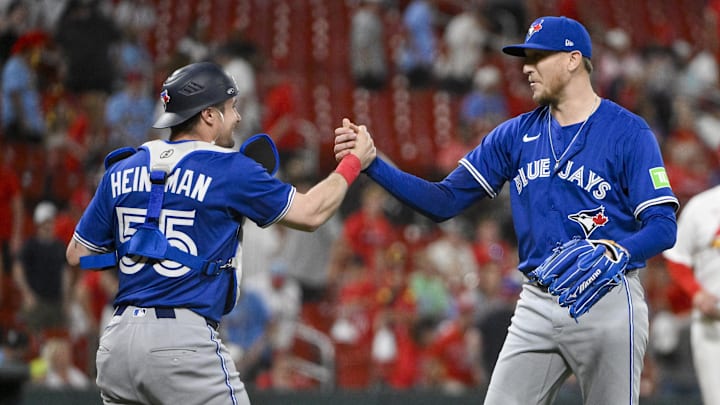 Jun 9, 2025; St. Louis, Missouri, USA; Toronto Blue Jays relief pitcher Jeff Hoffman (23) celebrates with catcher Tyler Heineman (55) after the Blue Jays defeated the St. Louis Cardinals in ten innings at Busch Stadium. Jun 9, 2025; St. Louis, Missouri, USA; Toronto Blue Jays relief pitcher Jeff Hoffman (23) celebrates with catcher Tyler Heineman (55) after the Blue Jays defeated the St. Louis Cardinals in ten innings at Busch Stadium.