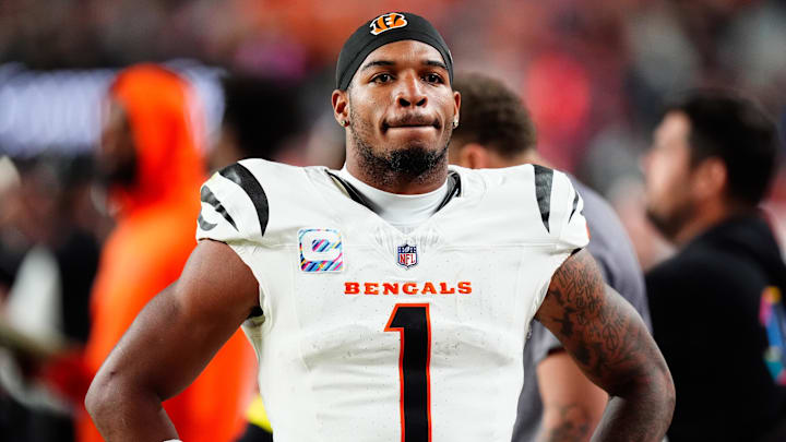 Sep 29, 2025; Denver, Colorado, USA; Cincinnati Bengals wide receiver Ja'Marr Chase (1) looks on after the game against the Denver Broncos at Empower Field at Mile High. Mandatory Credit: Ron Chenoy-Imagn Images
