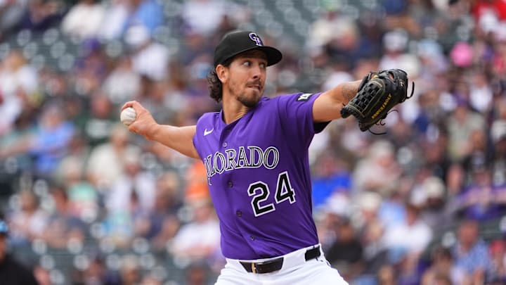 Apr 8, 2026; Denver, Colorado, USA; Colorado Rockies pitcher Michael Lorenzen (24) delivers a pitch in the fifth inning against the Houston Astros at Coors Field. Mandatory Credit: Ron Chenoy-Imagn Images