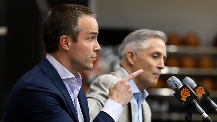 Jun 10, 2025; Scottsdale, AZ, USA; Phoenix Suns head coach Jordan Ott reacts as he speaks alongside general manager Brian Gregory during an introductory press conference at the Verizon 5g Performance Center. Mandatory Credit: Mark J. Rebilas-Imagn Images