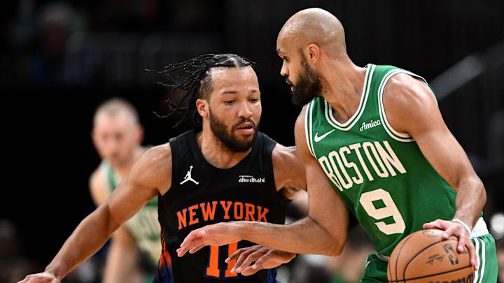 Dec 2, 2025; Boston, Massachusetts, USA; New York Knicks guard Jalen Brunson (11) defends Boston Celtics guard Derrick White (9) during the first half at the TD Garden. Mandatory Credit: Brian Fluharty-Imagn Images