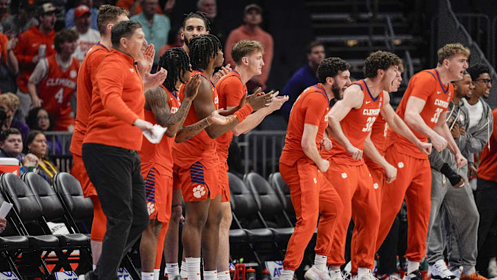 Mar 14, 2025; Charlotte, NC, USA; A late flurry and a reaction from the Clemson Tigers bench during the second half against the Louisville Cardinals at Spectrum Center. Mar 14, 2025; Charlotte, NC, USA; A late flurry and a reaction from the Clemson Tigers bench during the second half against the Louisville Cardinals at Spectrum Center.