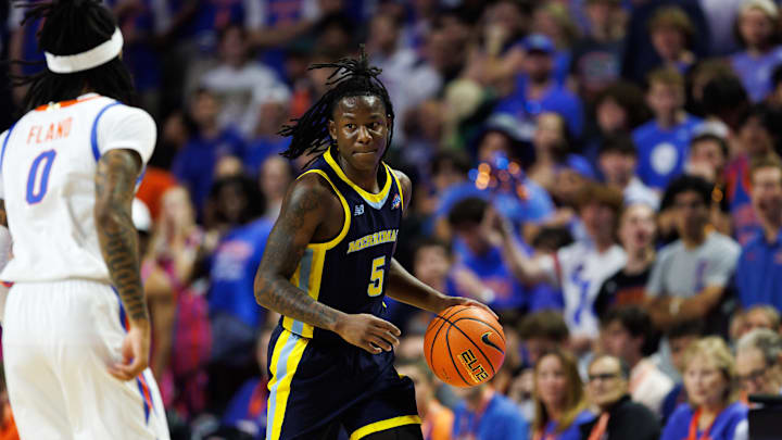 Nov 21, 2025; Gainesville, Florida, USA; Merrimack Warriors guard Kevair Kennedy (5) dribbles the ball at Florida Gators guard Boogie Fland (0) during the first half at Exactech Arena at the Stephen C. O'Connell Center. Mandatory Credit: Matt Pendleton-Imagn Images Nov 21, 2025; Gainesville, Florida, USA; Merrimack Warriors guard Kevair Kennedy (5) dribbles the ball at Florida Gators guard Boogie Fland (0) during the first half at Exactech Arena at the Stephen C. O'Connell Center. Mandatory Credit: Matt Pendleton-Imagn Images