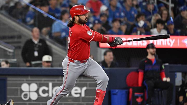 Sep 25, 2026; Toronto, Ontario, CAN; Cincinnati Reds third baseman Eugenio Suarez (28) hits a single against the Toronto Blue Jays in the third inning at Rogers Centre. Mandatory Credit: Dan Hamilton-Imagn Images Sep 25, 2026; Toronto, Ontario, CAN; Cincinnati Reds third baseman Eugenio Suarez (28) hits a single against the Toronto Blue Jays in the third inning at Rogers Centre. Mandatory Credit: Dan Hamilton-Imagn Images