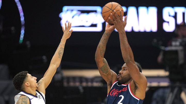 Apr 5, 2026; Sacramento, California, USA; LA Clippers forward Kawhi Leonard (2) shoots against Sacramento Kings guard Nique Clifford (left) during the first quarter at Golden 1 Center. Mandatory Credit: Darren Yamashita-Imagn Images Apr 5, 2026; Sacramento, California, USA; LA Clippers forward Kawhi Leonard (2) shoots against Sacramento Kings guard Nique Clifford (left) during the first quarter at Golden 1 Center. Mandatory Credit: Darren Yamashita-Imagn Images
