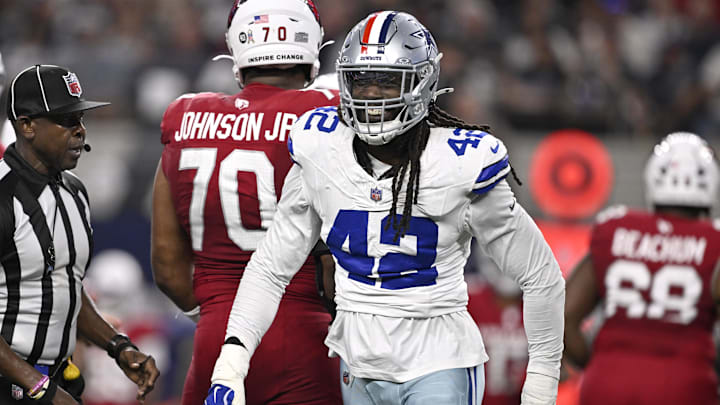 Nov 3, 2025; Arlington, Texas, USA; Dallas Cowboys defensive end Jadeveon Clowney (42) reacts after a sack against Arizona Cardinals quarterback Jacoby Brissett (7) in the first half at AT&T Stadium. Mandatory Credit: Jerome Miron-Imagn Images