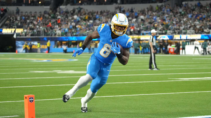 Dec 8, 2025; Inglewood, California, USA; Los Angeles Chargers running back Omarion Hampton (8) runs for a touchdown against the Philadelphia Eagles in the first half at SoFi Stadium. Dec 8, 2025; Inglewood, California, USA; Los Angeles Chargers running back Omarion Hampton (8) runs for a touchdown against the Philadelphia Eagles in the first half at SoFi Stadium.