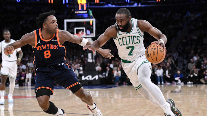 Apr 8, 2025; New York, New York, USA; Boston Celtics guard Jaylen Brown (7) drives past New York Knicks forward OG Anunoby (8) during the second half at Madison Square Garden. Mandatory Credit: John Jones-Imagn Images