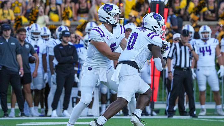 Aug 28, 2025; Columbia, Missouri, USA; Central Arkansas Bears quarterback Luther Richesson (5) hands off to running back Landen Chambers (0) against the Missouri Tigers during the game at Faurot Field at Memorial Stadium. Mandatory Credit: Denny Medley-Imagn Images Aug 28, 2025; Columbia, Missouri, USA; Central Arkansas Bears quarterback Luther Richesson (5) hands off to running back Landen Chambers (0) against the Missouri Tigers during the game at Faurot Field at Memorial Stadium. Mandatory Credit: Denny Medley-Imagn Images