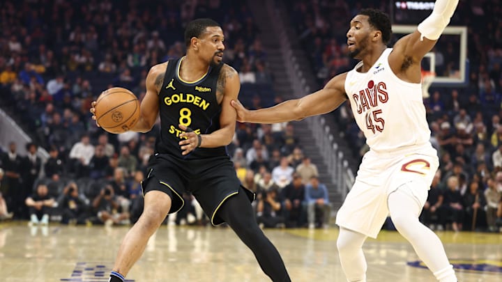 Apr 2, 2026; San Francisco, California, USA; Golden State Warriors forward/center De'Anthony Melton (8) controls the ball against Cleveland Cavaliers guard Donovan Mitchell (45) during the first quarter at Chase Center. Mandatory Credit: Kelley L Cox-Imagn Images