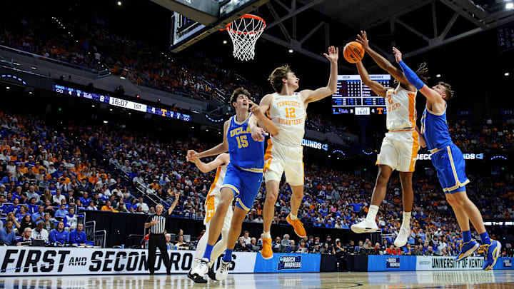Mar 22, 2025; Lexington, KY, USA; Tennessee Volunteers guard Chaz Lanier (2) and UCLA Bruins forward Tyler Bilodeau (34) go for a rebound during the first half in the second round of the NCAA Tournament at Rupp Arena. Mandatory Credit: Jordan Prather-Imagn Images