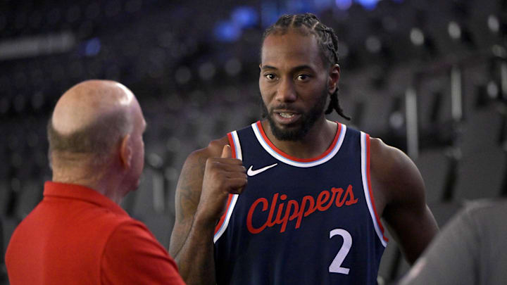 Sep 30, 2024; Inglewood, CA, USA;  Los Angeles Clippers forward Kawhi Leonard (2) talks with team owner Steve Ballmer during media day at Intuit Dome. Mandatory Credit: Jayne Kamin-Oncea-Imagn Images