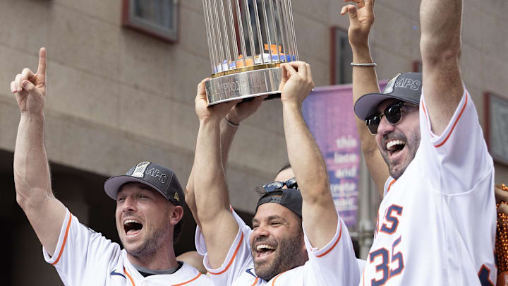 Nov 7, 2022: Houston Astros third baseman Alex Bregman (2), second baseman Jose Altuve (27), and starting pitcher Justin Verlander (35) celebrate with the 2022 Commissioner's Trophy in the Houston Astros Championship Parade in Houston, Texas, USA. Nov 7, 2022: Houston Astros third baseman Alex Bregman (2), second baseman Jose Altuve (27), and starting pitcher Justin Verlander (35) celebrate with the 2022 Commissioner's Trophy in the Houston Astros Championship Parade in Houston, Texas, USA.