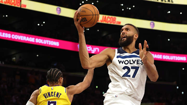 Minnesota Timberwolves center Rudy Gobert (27) shoots against Los Angeles Lakers guard Gabe Vincent during the fourth quarter at Crypto.com Arena in Los Angeles on Oct. 22, 2024.