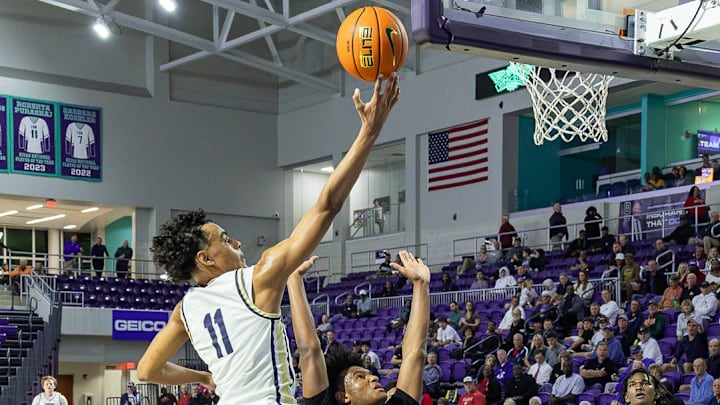 Principia Panthers guard Quentin Coleman (11) goes for a lay up during a City of Palms Classic semifinal game against the Paul VI Panthers at Suncoast Credit Union Arena in Fort Myers, Fla., on Monday, Dec. 22, 2025.
