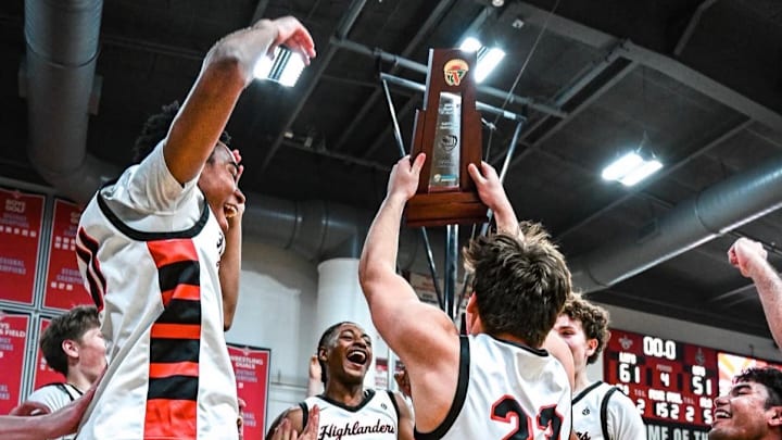 Lake Highland Prep boys' basketball team celebrates its 61-51 victory against Windermere Prep to win the Class 3A, District 6 championship. The Highlanders have won 22 consecutive games.