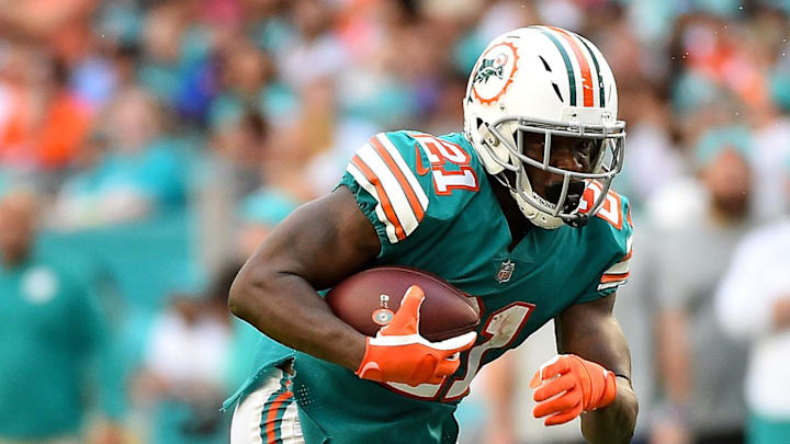 Dec 2, 2018; Miami Gardens, FL, USA; Miami Dolphins running back Frank Gore (21) carries the ball against the Buffalo Bills during the first half at Hard Rock Stadium. Mandatory Credit: Jasen Vinlove-Imagn Images