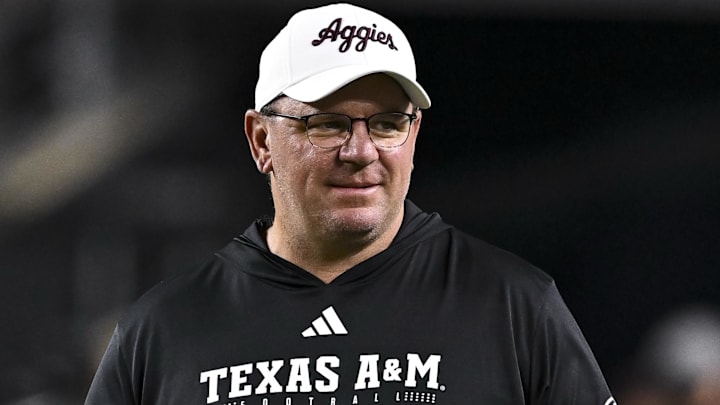 Texas A&M Aggies head coach Mike Elko walks on the field prior to the game against the New Mexico State Aggies at Kyle Field. 