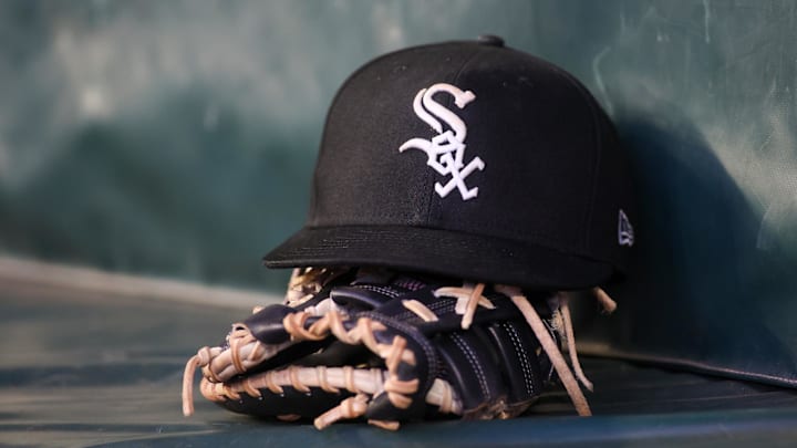 Jul 14, 2023; Atlanta, Georgia, USA; A detailed view of a Chicago White Sox hat and glove in the dugout against the Atlanta Braves in the fourth inning at Truist Park. Mandatory Credit: Brett Davis-Imagn Images Jul 14, 2023; Atlanta, Georgia, USA; A detailed view of a Chicago White Sox hat and glove in the dugout against the Atlanta Braves in the fourth inning at Truist Park. Mandatory Credit: Brett Davis-Imagn Images