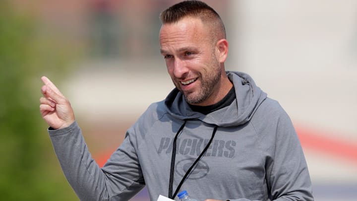 Green Bay Packers defensive coordinator Jeff Hafley interacts with fans before the start of practice on July 25, 2025, in Green Bay, Wis.