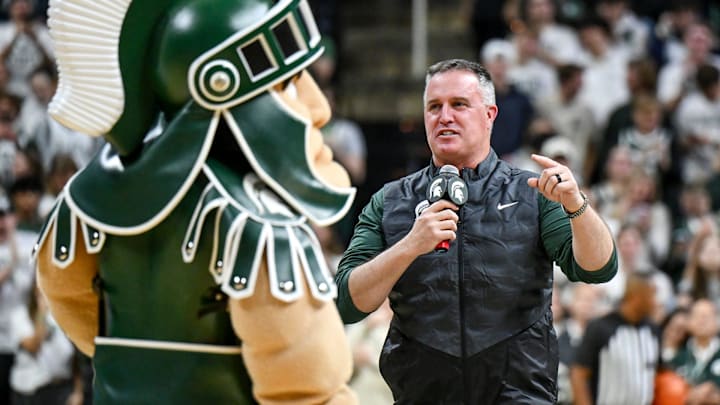 Michigan State's new football coach Pat Fitzgerald addresses the crowd during a timeout in the first half of the Spartans basketball game against Iowa on Tuesday, Dec. 2, 2025, at the Breslin Center in East Lansing.