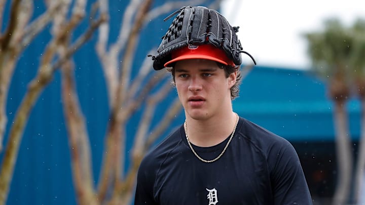 Detroit Tigers pitcher Jackson Jobe walks off the field after practice during spring training at