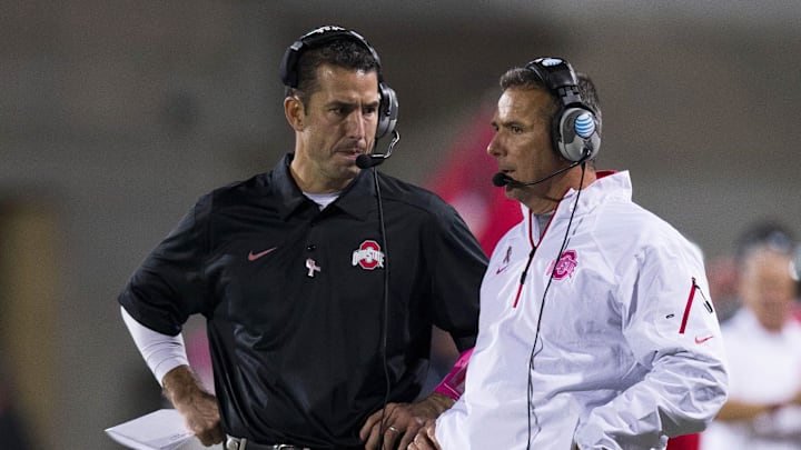 Oct 26, 2013; Columbus, OH, USA; Wisconsin Badgers head coach Luke Fickell stands next to former Ohio State head coach Urban Meyer when they were both on staff with the Buckeyes
