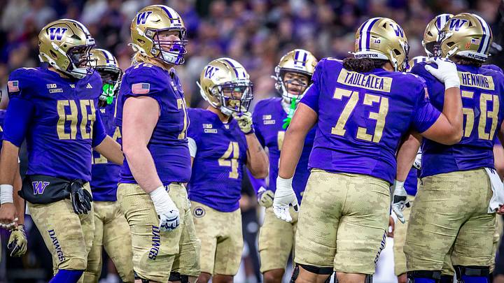 John Mills, second from left, and his UW teammates are projected to be a nine-win team.