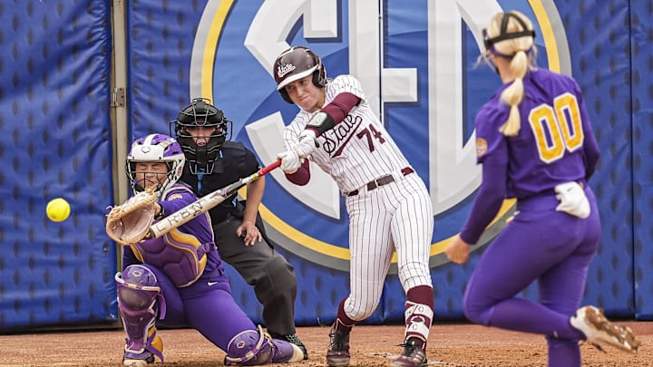 May 7, 2025; Athens, GA, USA; Mississippi St. catcher Ella Wesolowski (74) bats against LSU starting pitcher/relief pitcher Jayden Heavener (00) at Jack Turner Stadium. Mandatory Credit: Dale Zanine-Imagn Images
