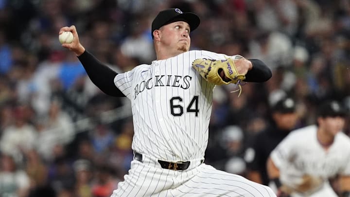 Jul 22, 2025; Denver, Colorado, USA; Colorado Rockies starting pitcher Bradley Blalock (64) delivers a pitch in the sixth inning against the St. Louis Cardinals at Coors Field.