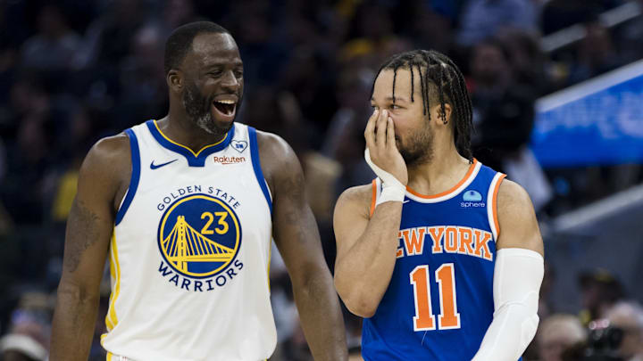 Mar 18, 2024; San Francisco, California, USA; Golden State Warriors center Draymond Green (23) and New York Knicks guard Jalen Brunson (11) share a laugh during the first half at Chase Center. Mandatory Credit: John Hefti-USA TODAY Sports