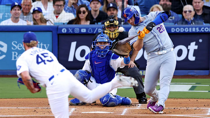 Oct 20, 2024; Los Angeles, California, USA; New York Mets first base Pete Alonso (20) hits and reaches first base on an error during the first inning against the Los Angeles Dodgers during game six of the NLCS for the 2024 MLB playoffs at Dodger Stadium. Oct 20, 2024; Los Angeles, California, USA; New York Mets first base Pete Alonso (20) hits and reaches first base on an error during the first inning against the Los Angeles Dodgers during game six of the NLCS for the 2024 MLB playoffs at Dodger Stadium.