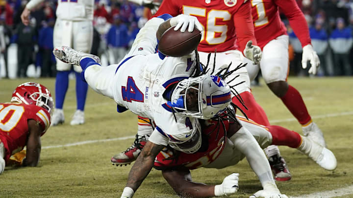 Jan 26, 2025; Kansas City, MO, USA; Buffalo Bills running back James Cook (4) dives for a touchdown against the Kansas City Chiefs during the second half in the AFC Championship game.