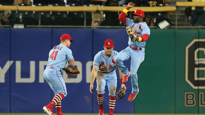 Sep 7, 2019; Pittsburgh, PA, USA;  St. Louis Cardinals left fielder Tyler O'Neill (41) and center fielder Harrison Bader (48) and right fielder Randy Arozarena (66) celebrate in the outfield after defeating the Pittsburgh Pirates at PNC Park. The Cardinals won 10-1. Mandatory Credit: Charles LeClaire-Imagn Images